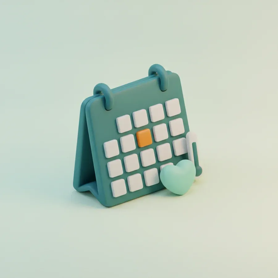 Teal desk calendar with one highlighted day and a small heart