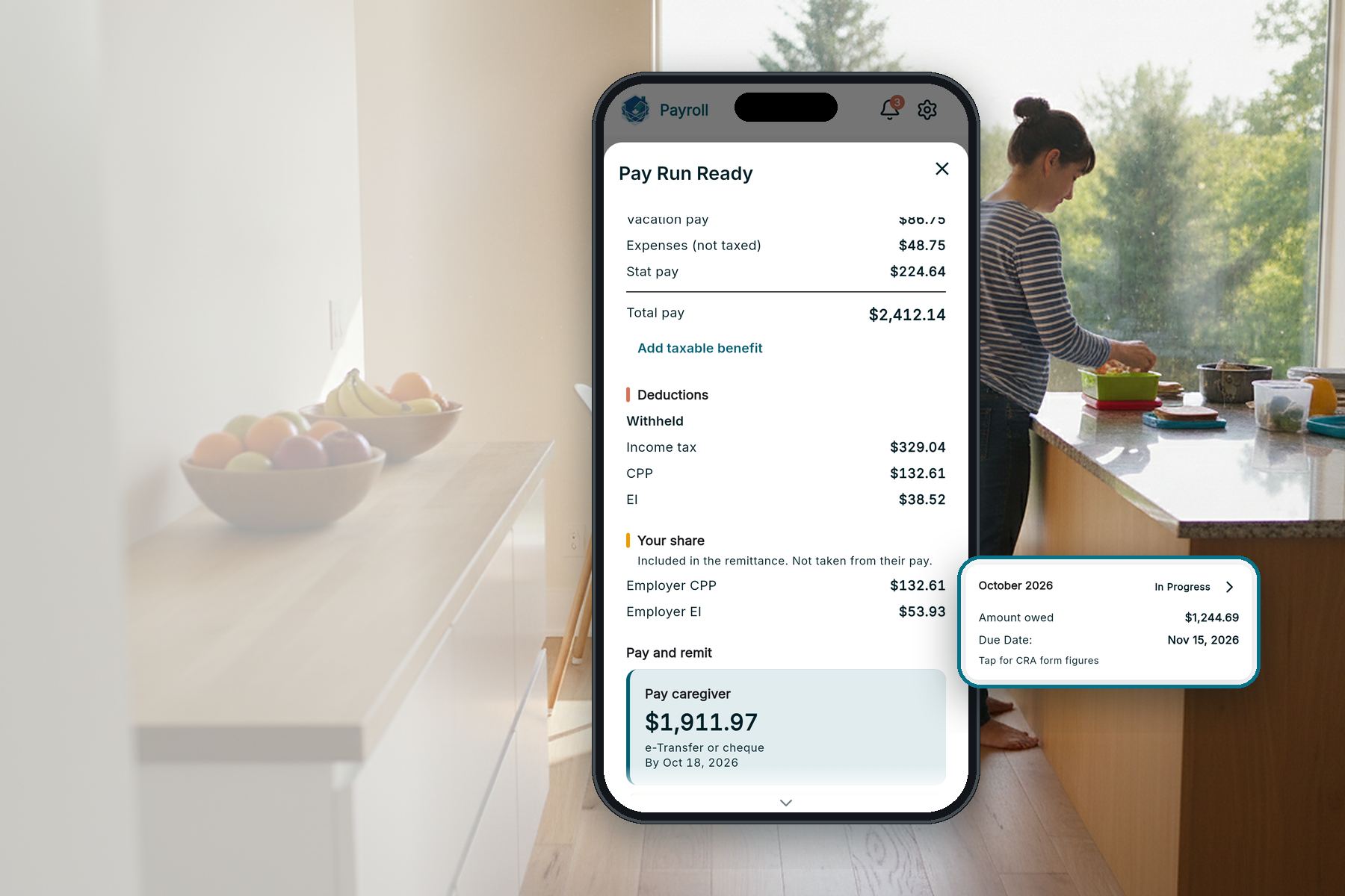 A phone showing a RoostPay nanny payroll run with CPP, EI and income tax, next to the month's remittance amount and due date, in a bright family kitchen where a parent packs a lunch